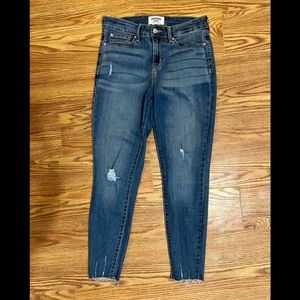 Stretchy medium wash, mid rise, ankle length raw hem